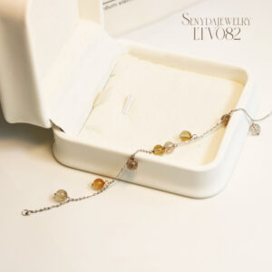 LTV082 Lắc tay vàng Senyda đá Thạch anh tóc treo