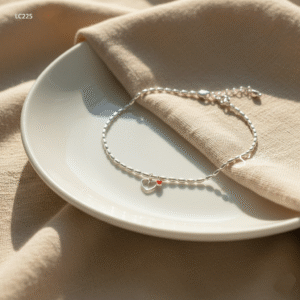 LC225 Lắc chân bạc Ý Senyda dây bi dài hạt gạo tim treo