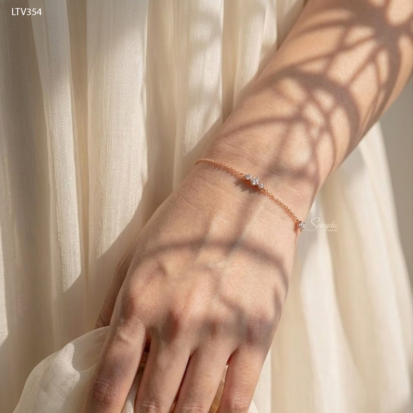 LTV354 Lắc tay vàng Senyda 3 nụ đá xen 1 nụ đá