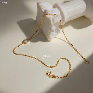 LCV047 Lắc chân vàng Senyda dây chữ cong mặt tim đá rỗng