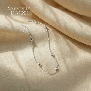 LCV080 Lắc chân vàng Senyda dây cong xen bi trơn nhỏ