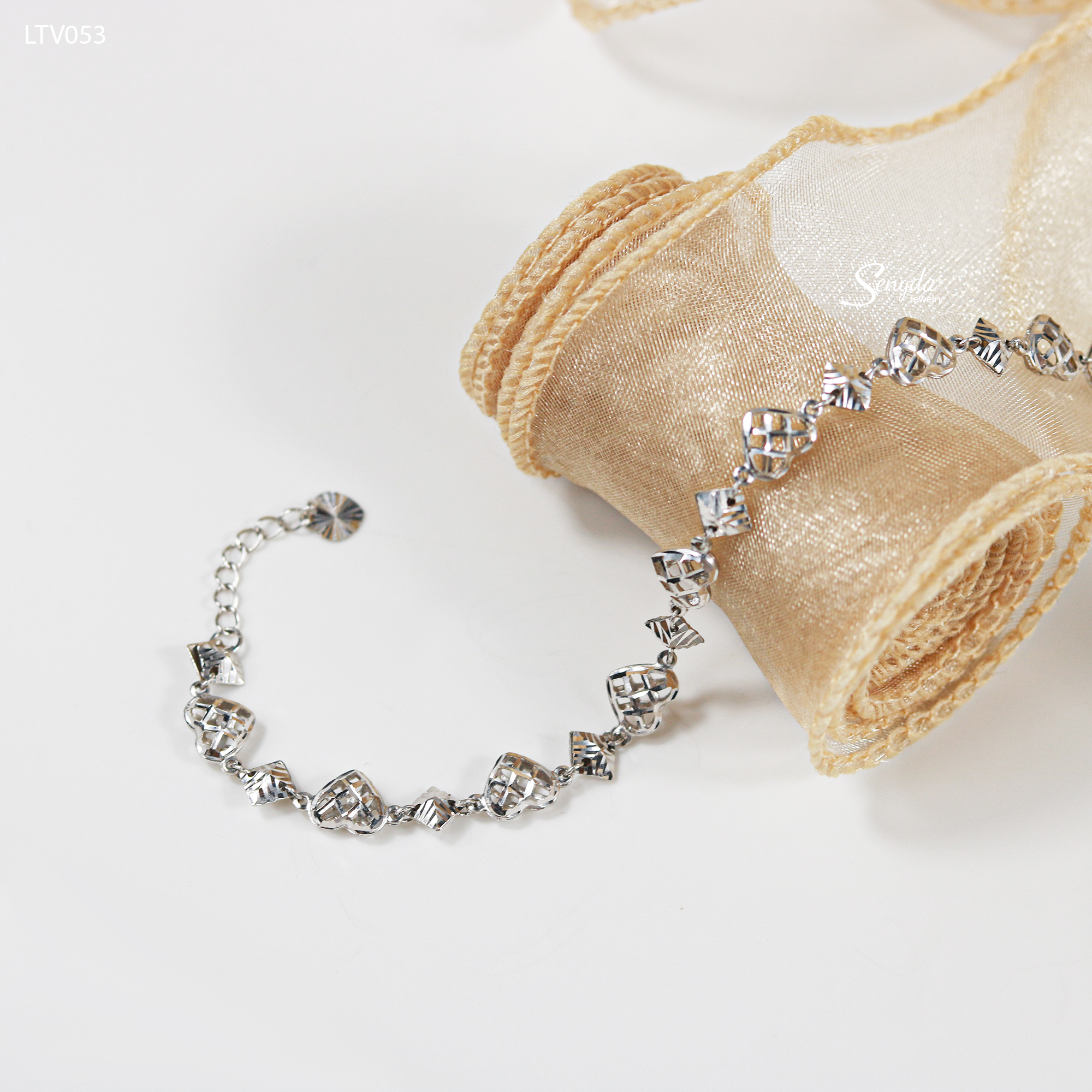 LTV053 Lắc tay vàng Senyda trái tim xen thoi giác nối liền