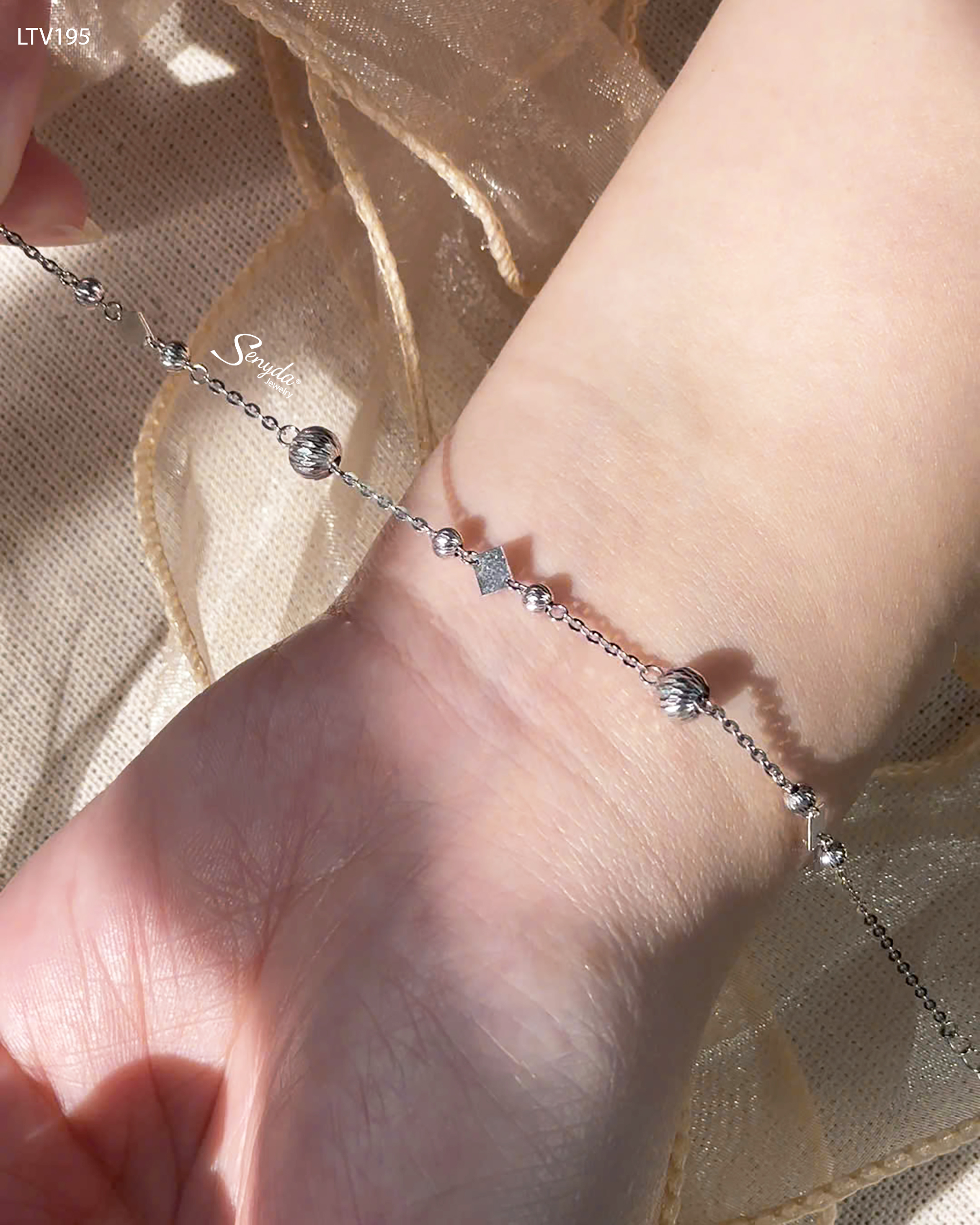 LTV195 Lắc tay vàng Senyda bi giác xen thoi trơn