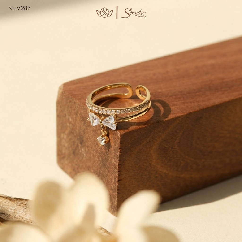 NHV287 Nhẫn vàng Senyda nửa hàng đá nơ tam giác nụ đá treo kép hở