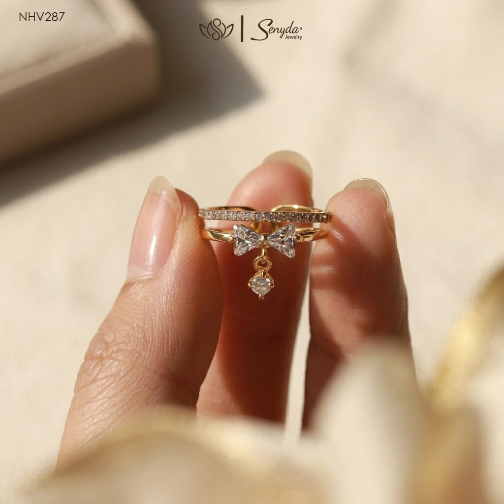 NHV287 Nhẫn vàng Senyda nửa hàng đá nơ tam giác nụ đá treo kép hở